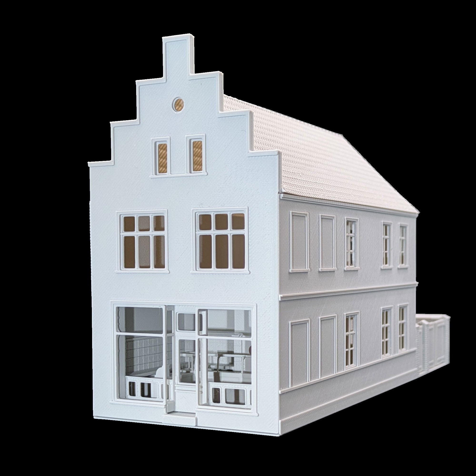 Perspektivische Seitenansicht eines Modellhauses in TT mit Ladengeschäft und detaillierter Fassadenstruktur.