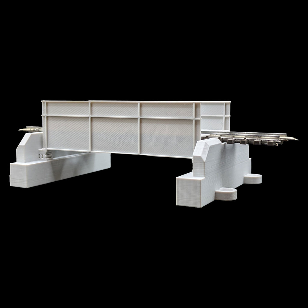 Seitenansicht der 3D-gedruckten eingleisigen Trogbrücke im Maßstab 1:87 mit detaillierten Widerlagern.