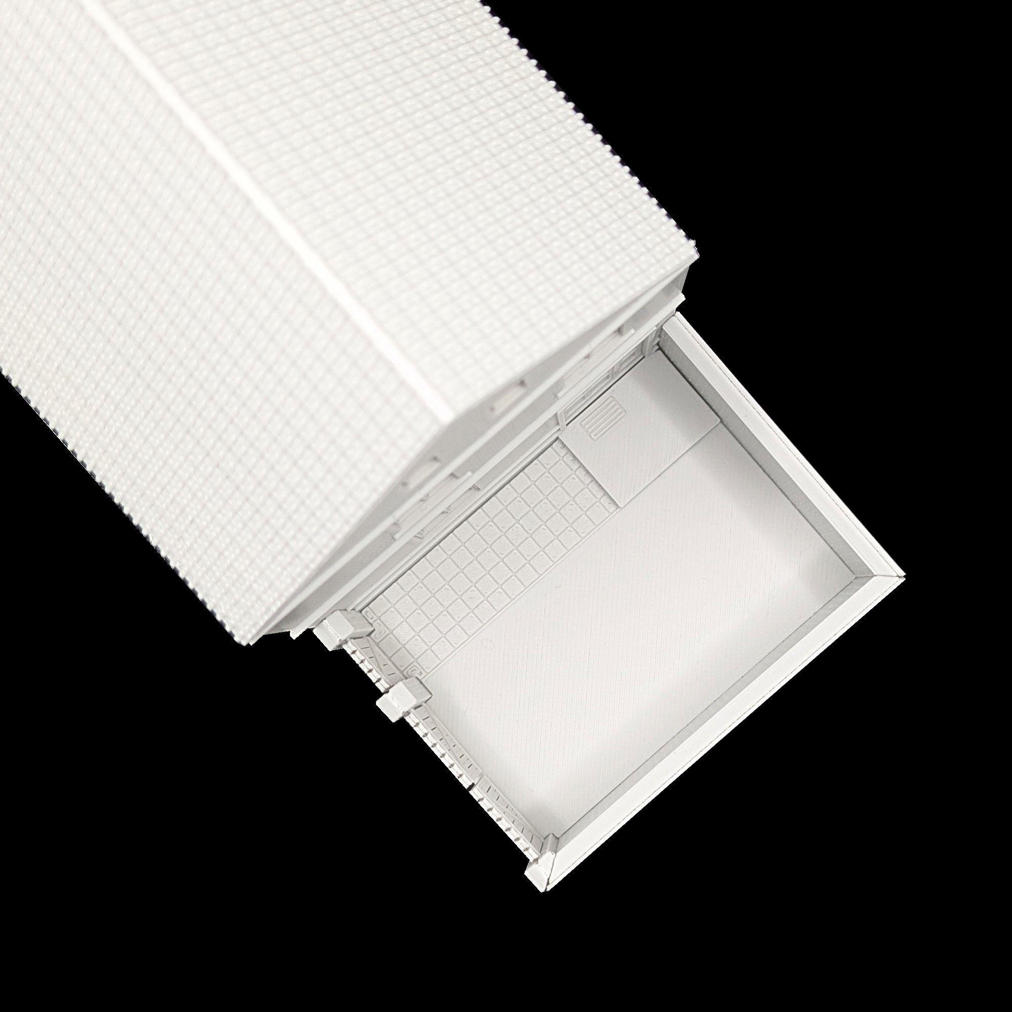 Draufsicht auf den gepflasterten Hinterhof des H0 Gebäudes inklusive Hofmauer und Tor.