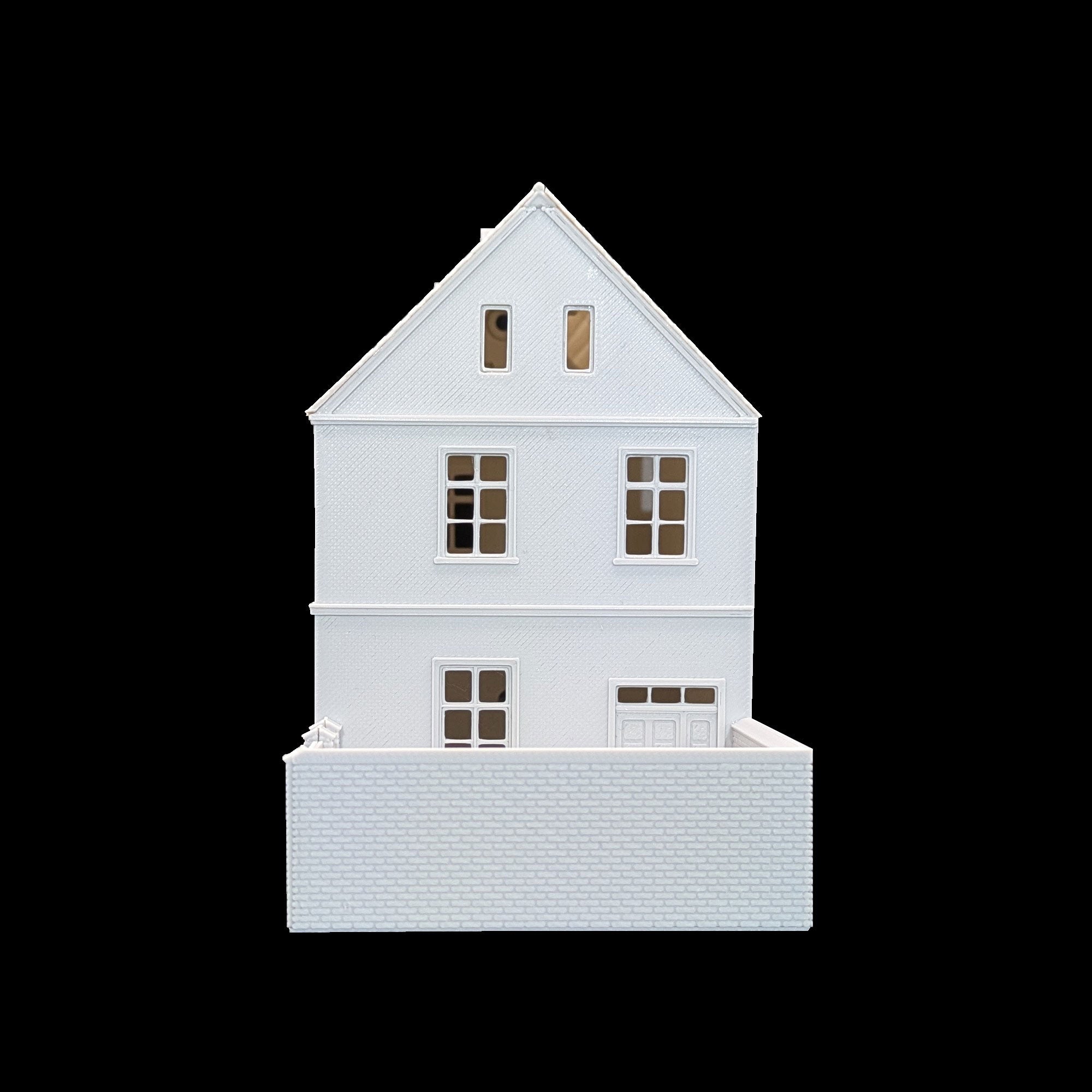 Rückseitige Ansicht des H0 Modellhaus-Bausatzes mit klassischem Sattelgiebel und Hintereingang.