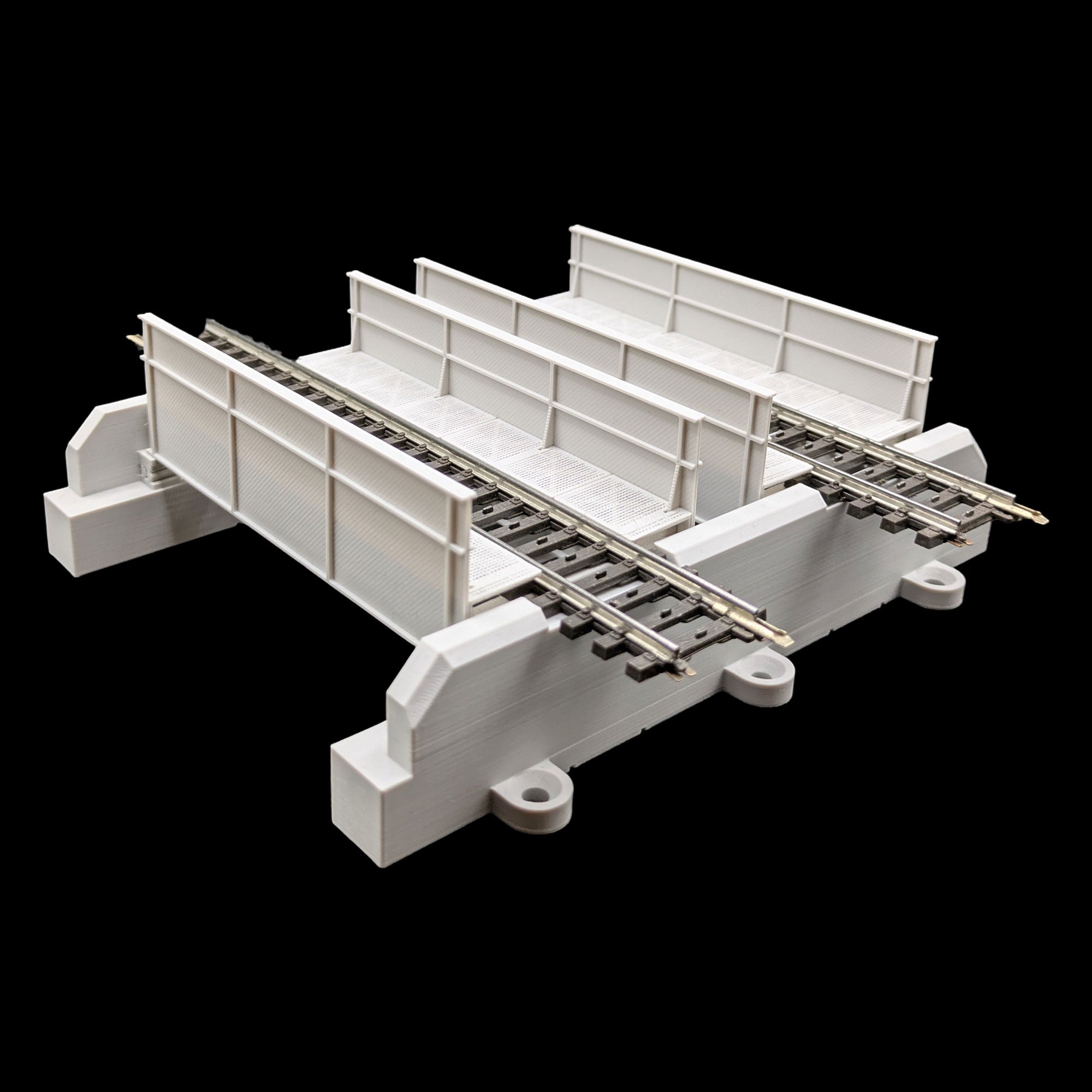 Seitenansicht der selbst entworfenen, zweigleisigen H0 Trogbrücke, zeigt die präzisen Verstrebungen und das graue 3D-Druck-Modell.