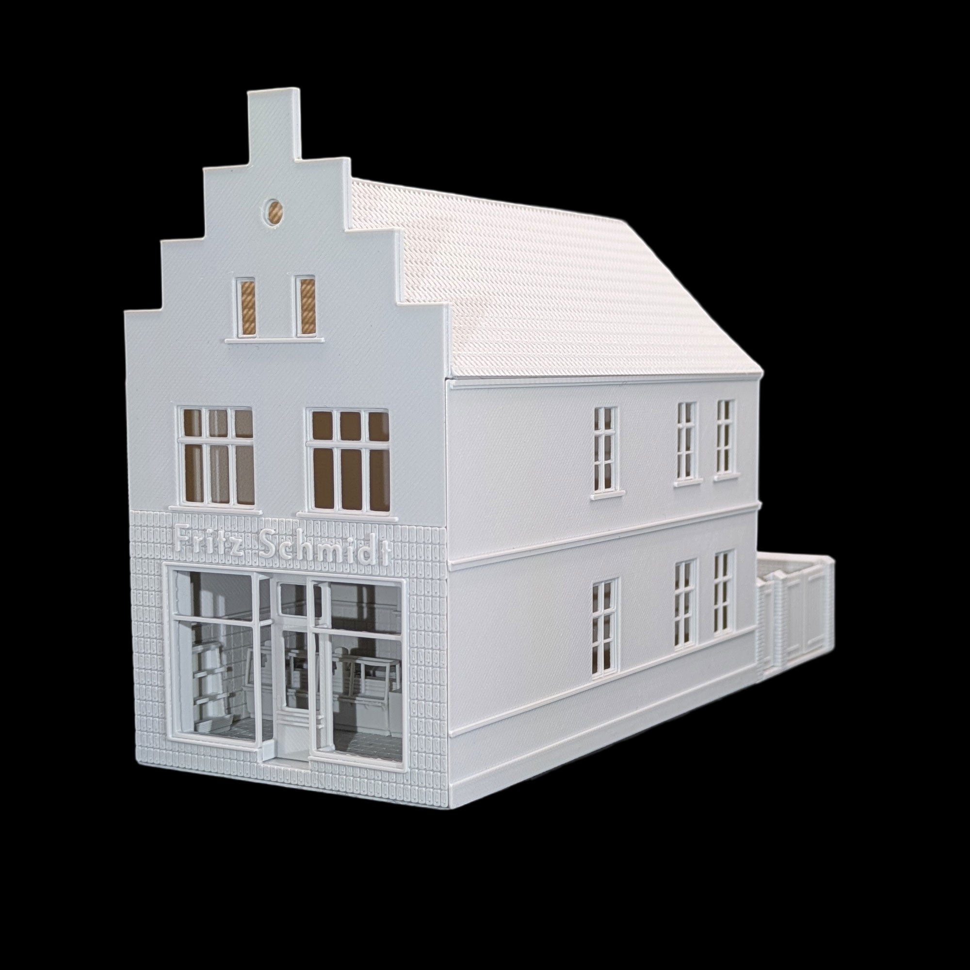 TT Modellbau Stadthaus mit Metzgerei "Fritz Schmidt", Treppengiebel und Schaufensterfront in Weiß.